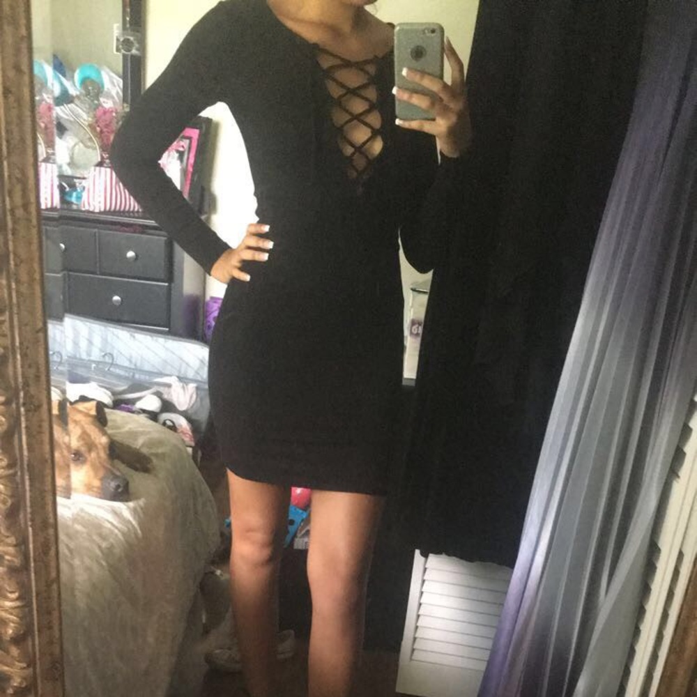 Tight, black mini dress