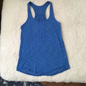 Blue Lululemon tank with slit in middle of back.