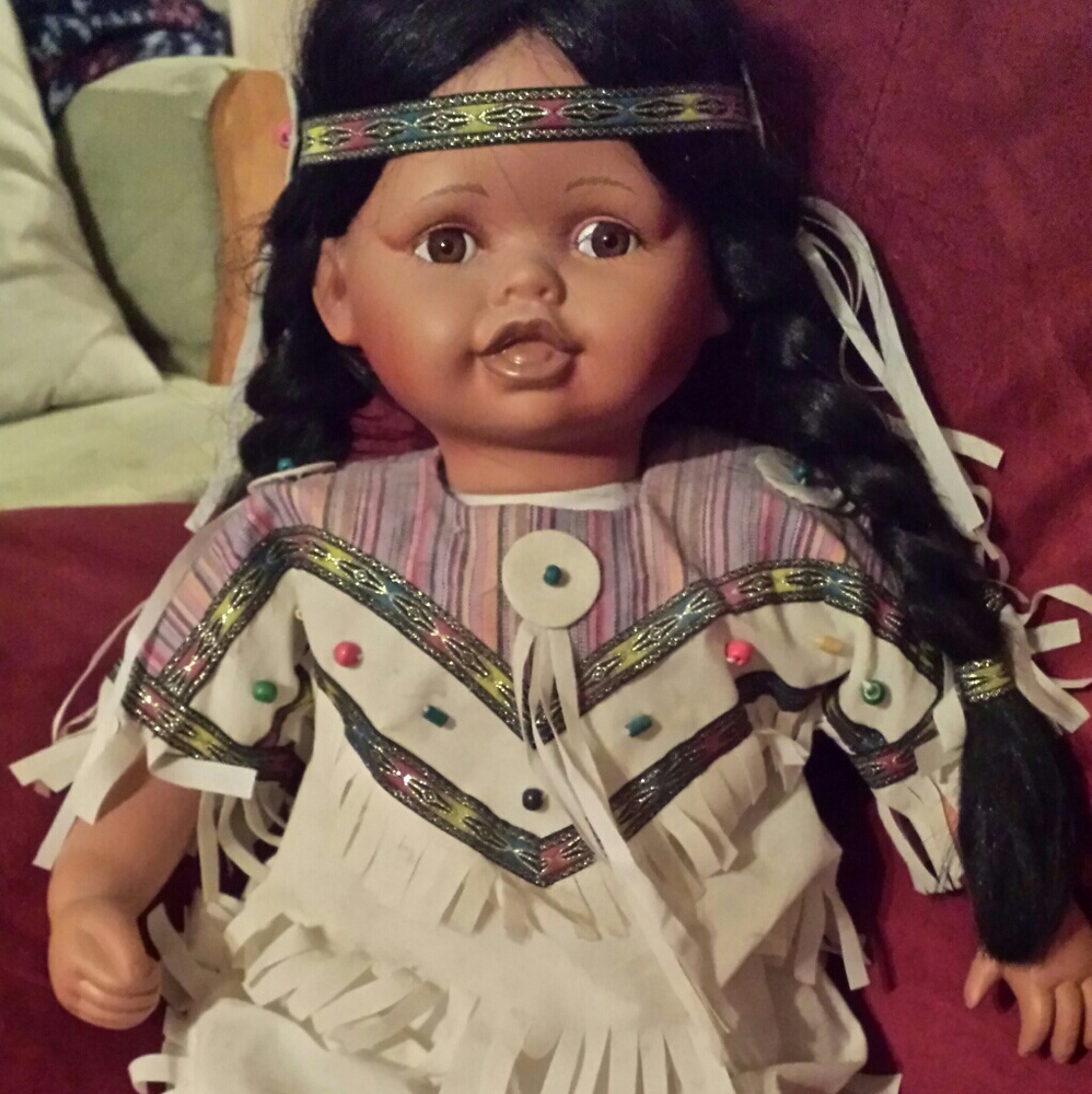Porcelain indian doll.