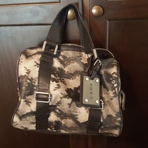 Black and white lace print L.A.M.B satchel