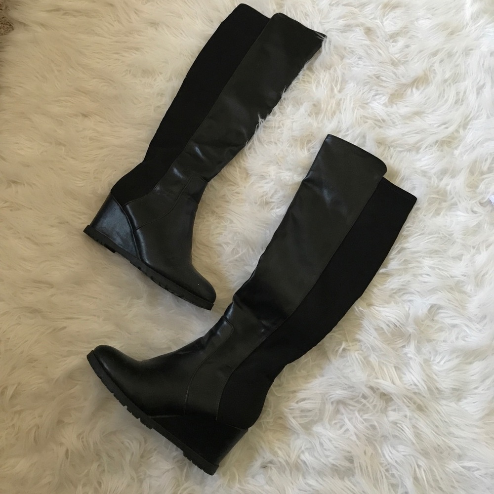 Knee high black wedge boots