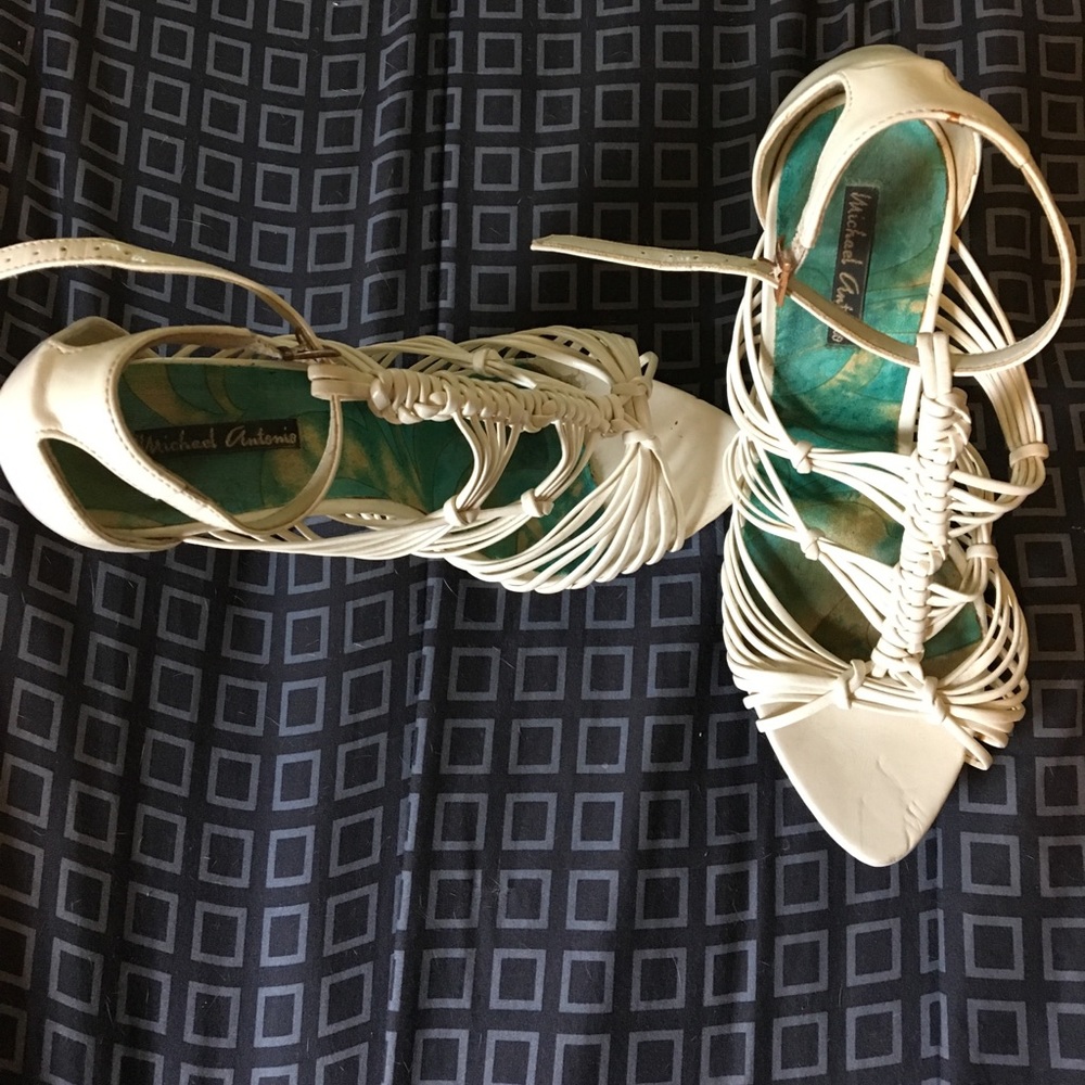 Strappy white Michael Antonio heels