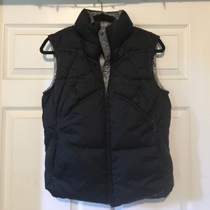 Black and silver reversible Nike down vest