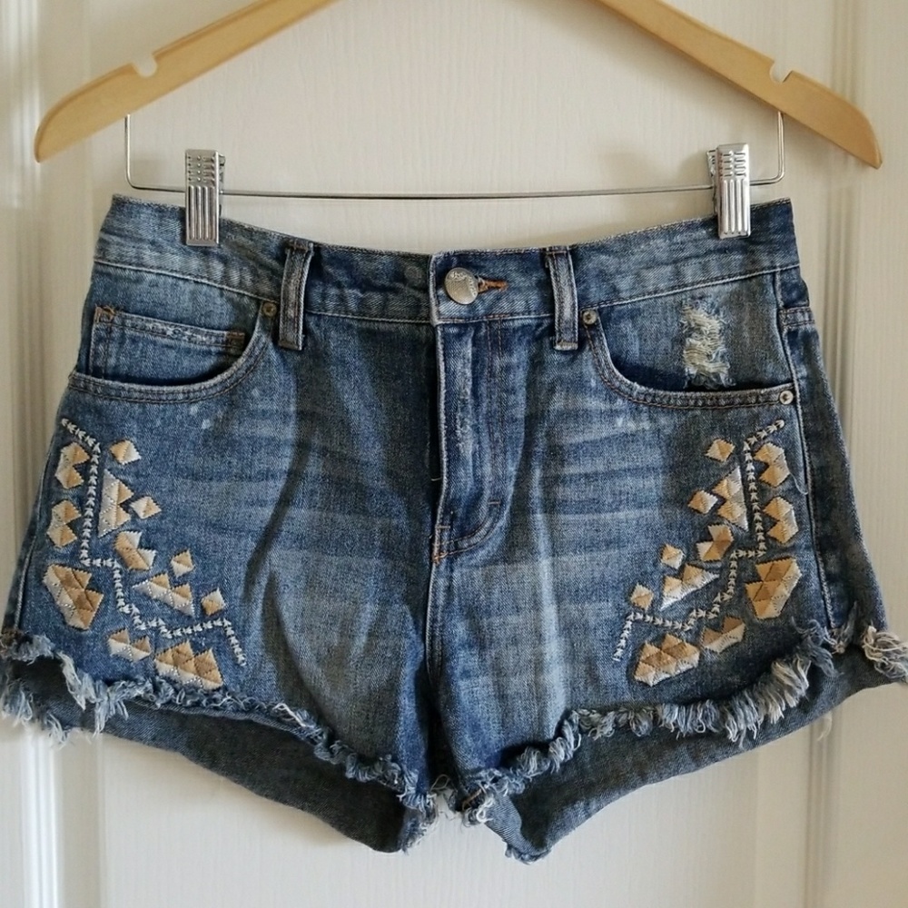 Free People cut off embroidered jean shorts
