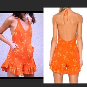 PRICE DROP! Ruffle bottoms MinkPink romper. NWT. S