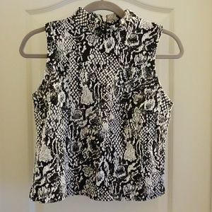 Snake print cropped top.