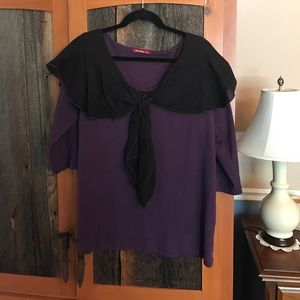 Purple t-shirt with black shawl collar