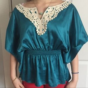 Teal blouse with embroidery