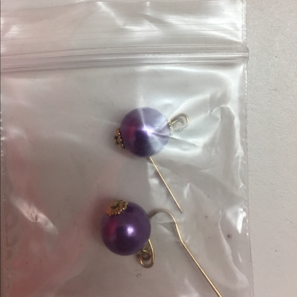 Kate Spade purple earrings.
