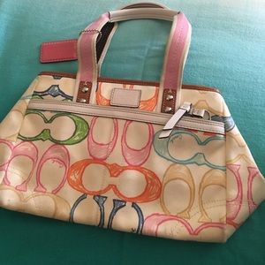 Coach purse with rainbow coach logo