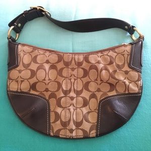 Small Coach purse with logo pattern