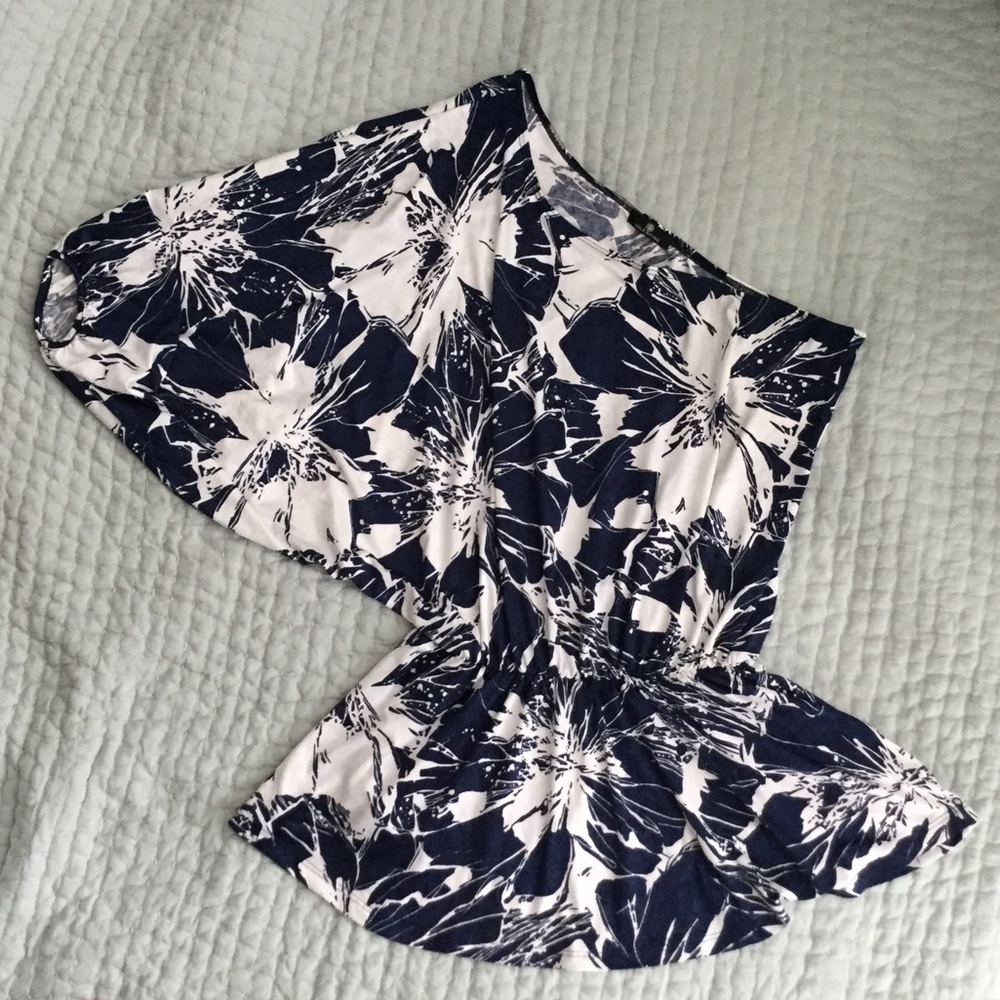 Cold shoulder with peplum blouse. Navy and white