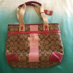 Coach purse with pink accents