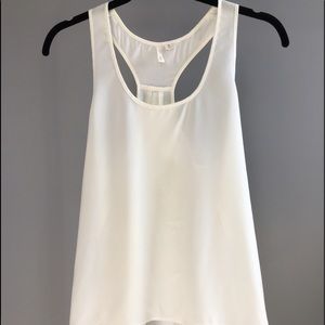White flowy tank.
