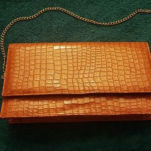PRICE DROP ORANGE CLUTCH