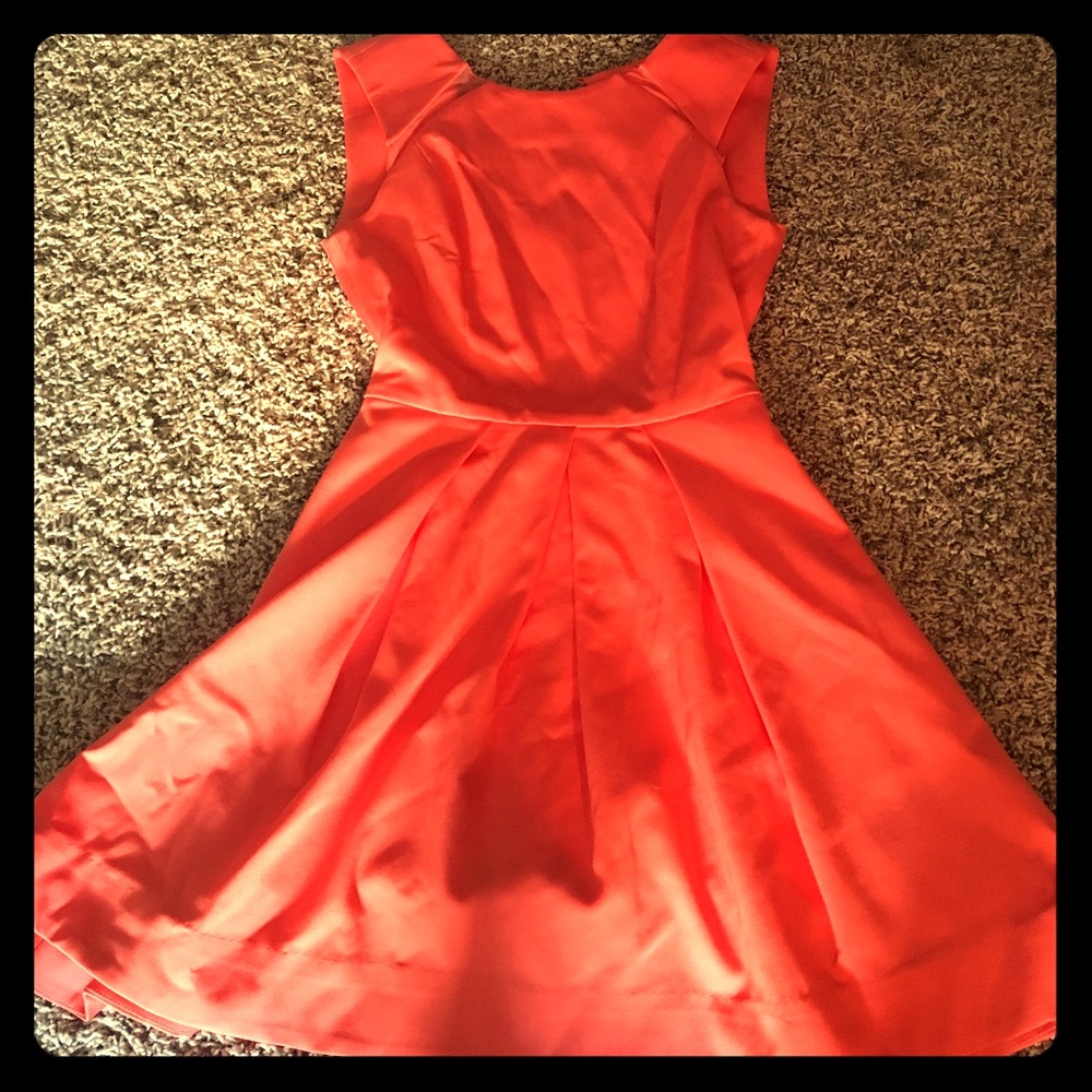 Bebe coral colored open back dress