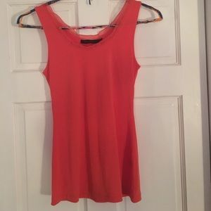 Orange tank with ruffle on top