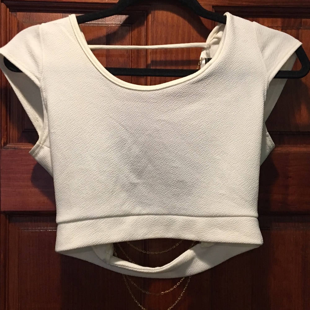 Open back crop top, with chains in the back.