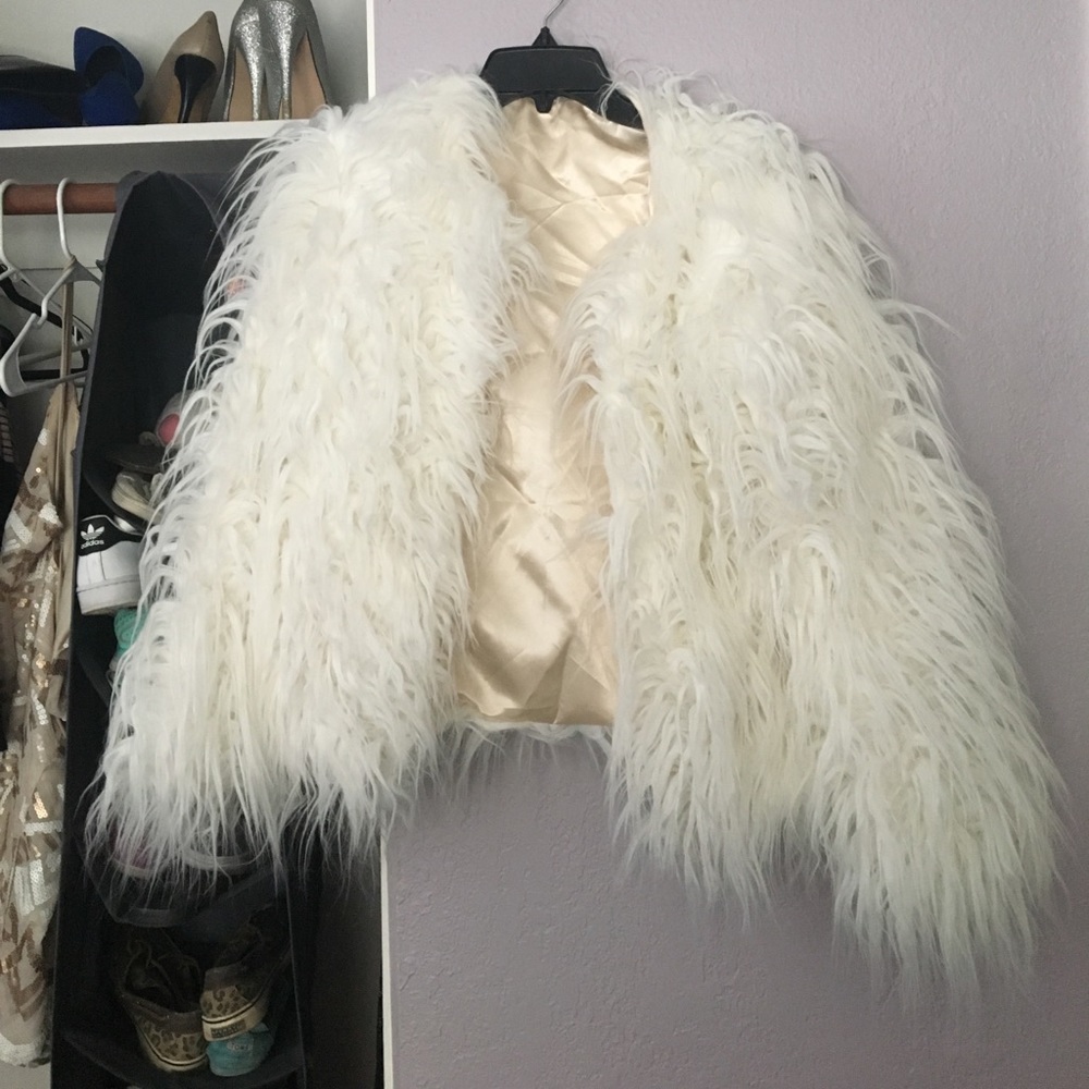 White faux fur coat