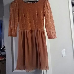 Salmon colored lace and pleats dress