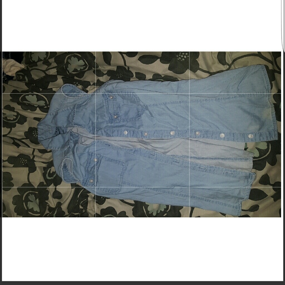 Baby blue button down collared sleeveless top