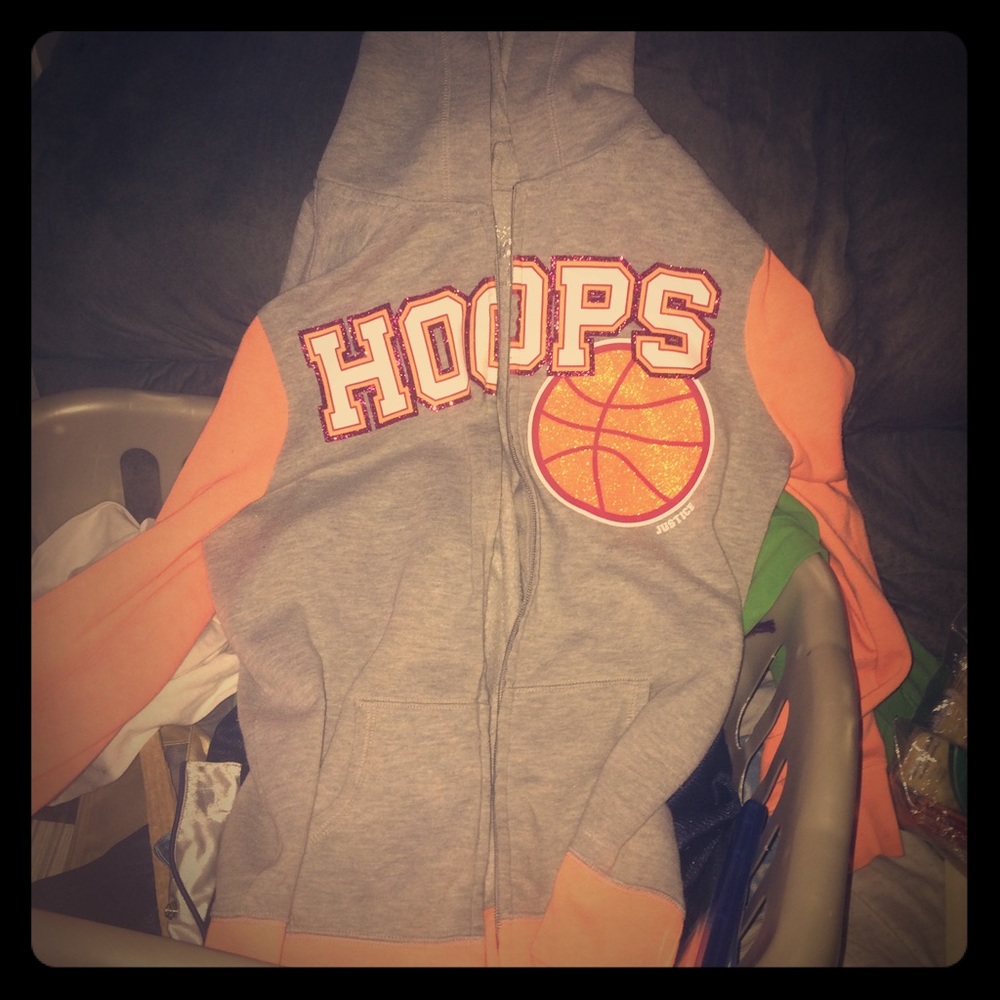 Justice orange and grey jacket that says hoops
