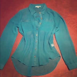 Sparkly turquoise blouse