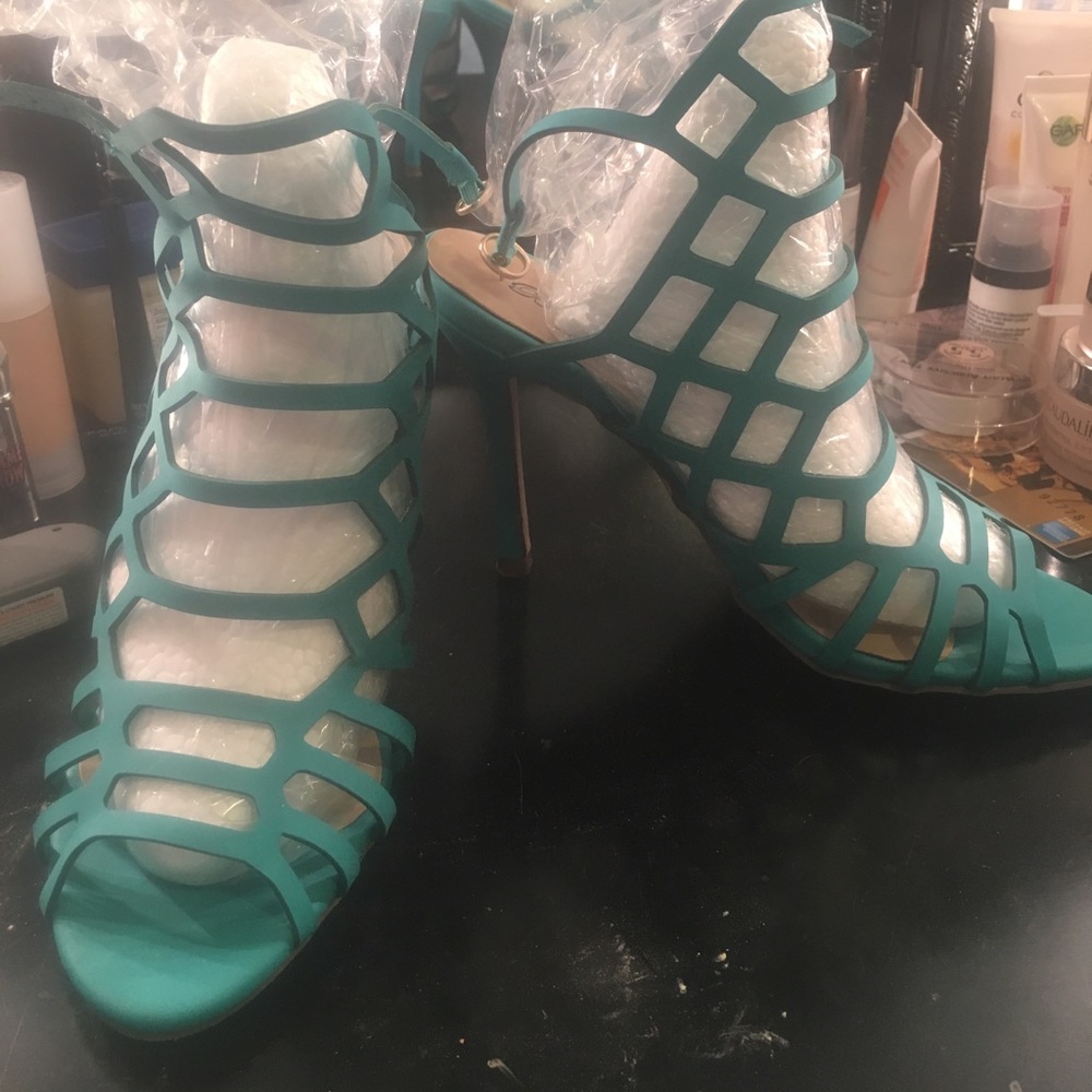 Turquoise caged shoes