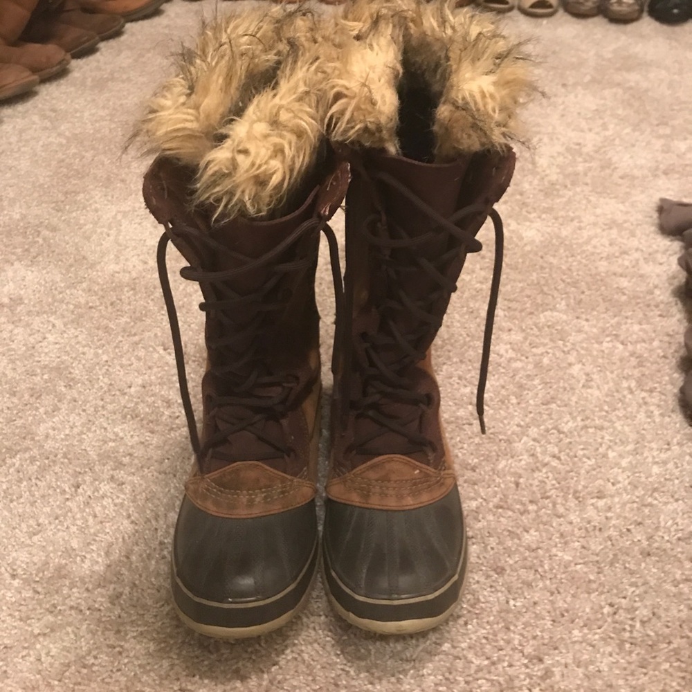 Knee high sorrell snow boots
