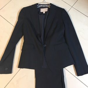 Navy blue pin striped suit, fully lined