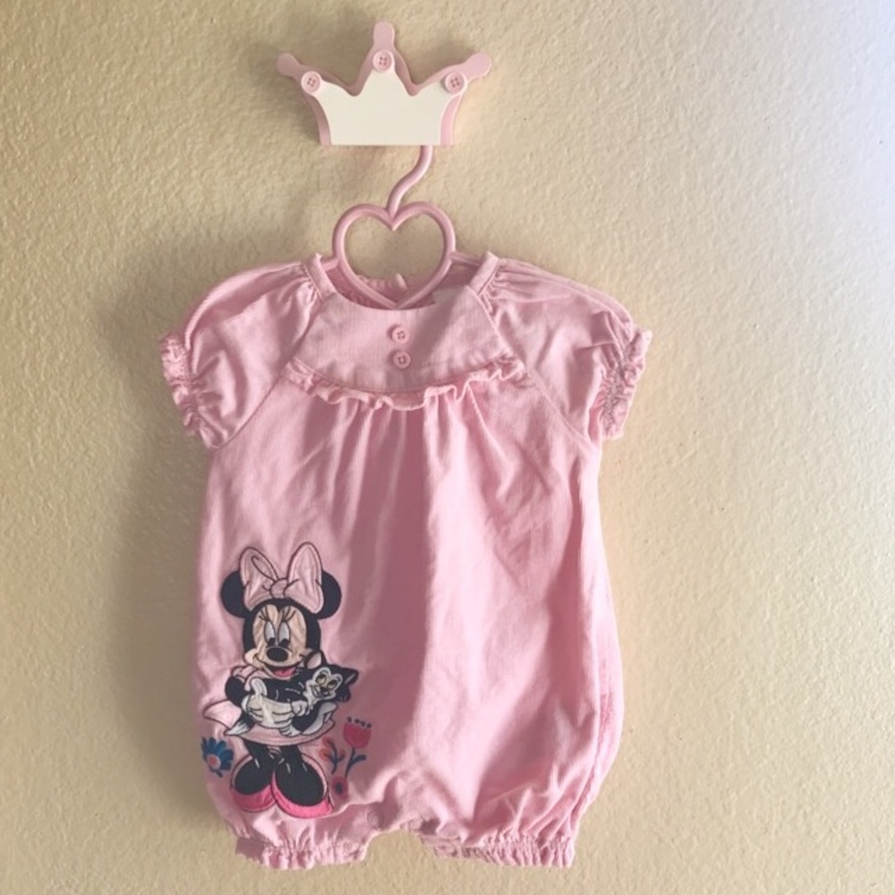 Minnie Mouse pink corduroy romper.