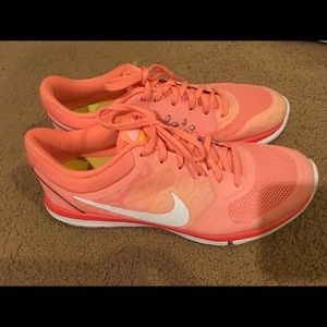 Coral Nike sneakers