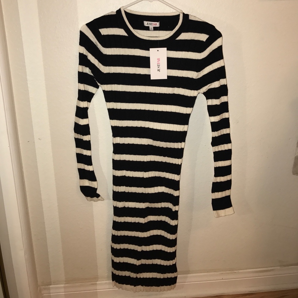 Black and white striped fitted dress.