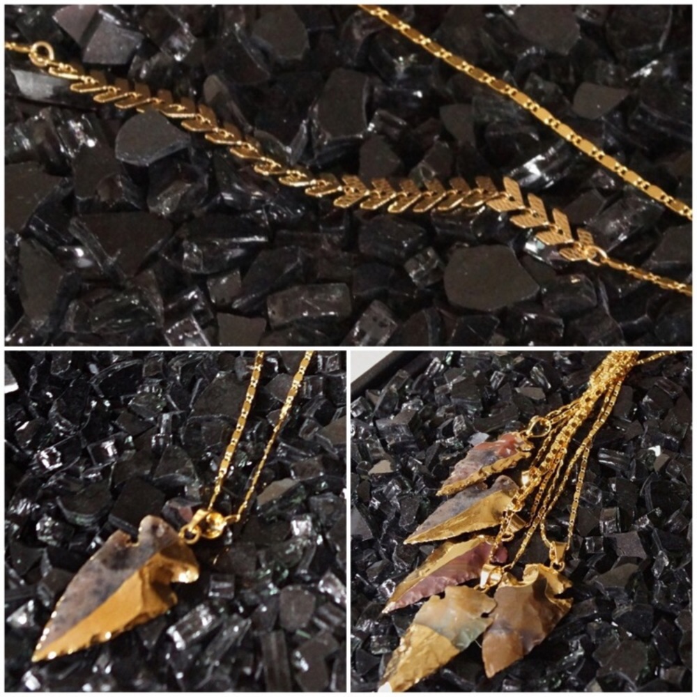 Adgate arrow necklace says 18 karat gold plated
