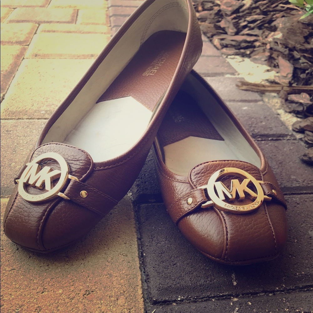 Brown leather flats