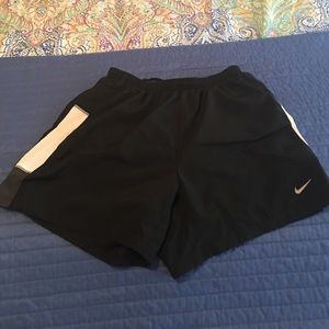 Men's M black Nike shorts with built in underwear.