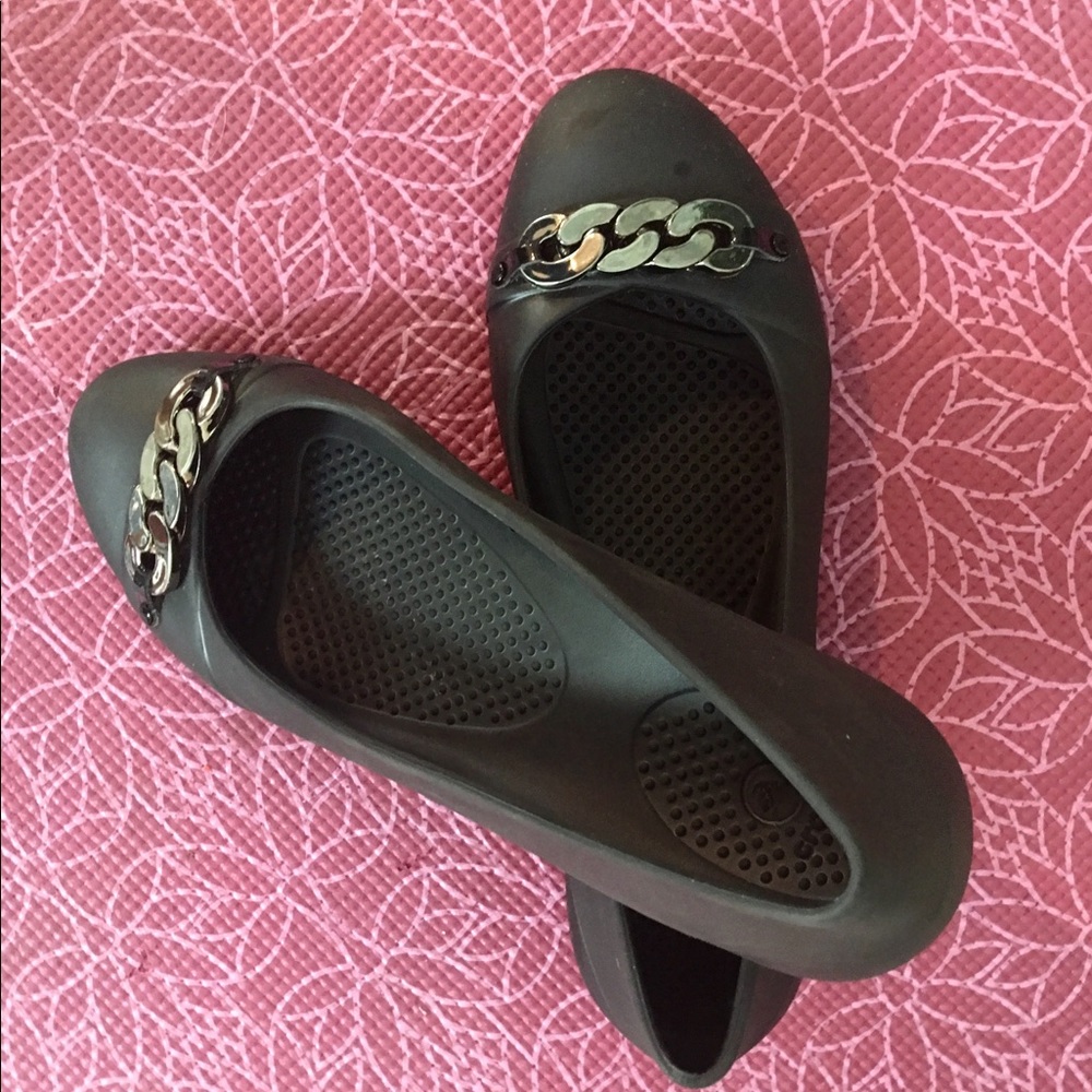 Black flats with silver chain detail Crocs