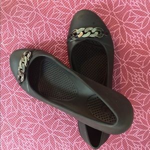 Black flats with silver chain detail Crocs
