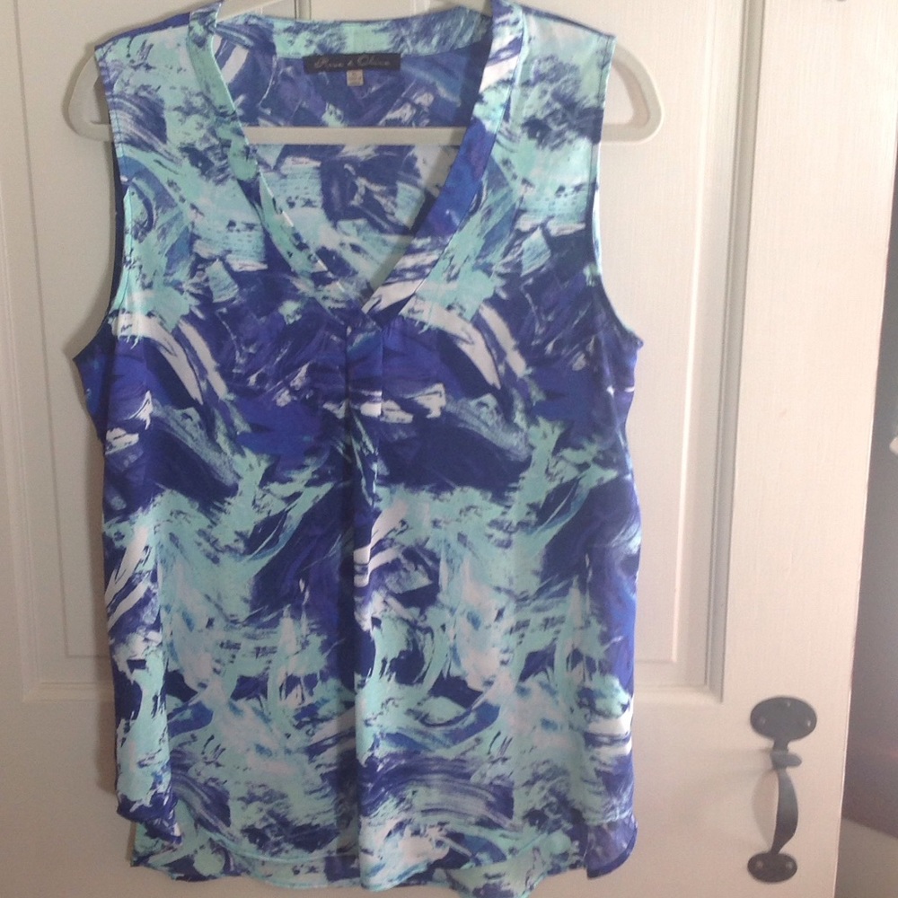 Multi- colored sleeveless v-neck blouse