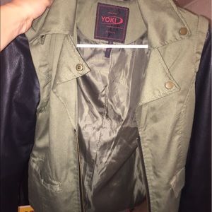 Olive green jacket with black leather sleeves
