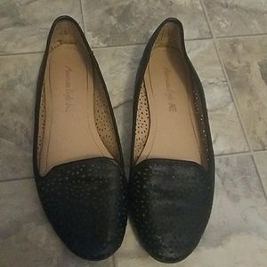 Perforated black flats