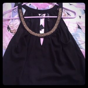 Dressy black top with gold neckline
