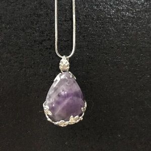 Very pretty purple gem pendent!