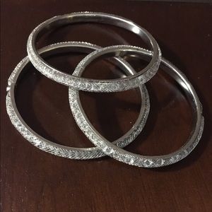 Set of three silver bangles