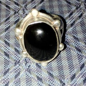 Silver ring with black stone