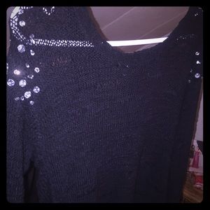 Black sweater with shoulder gems