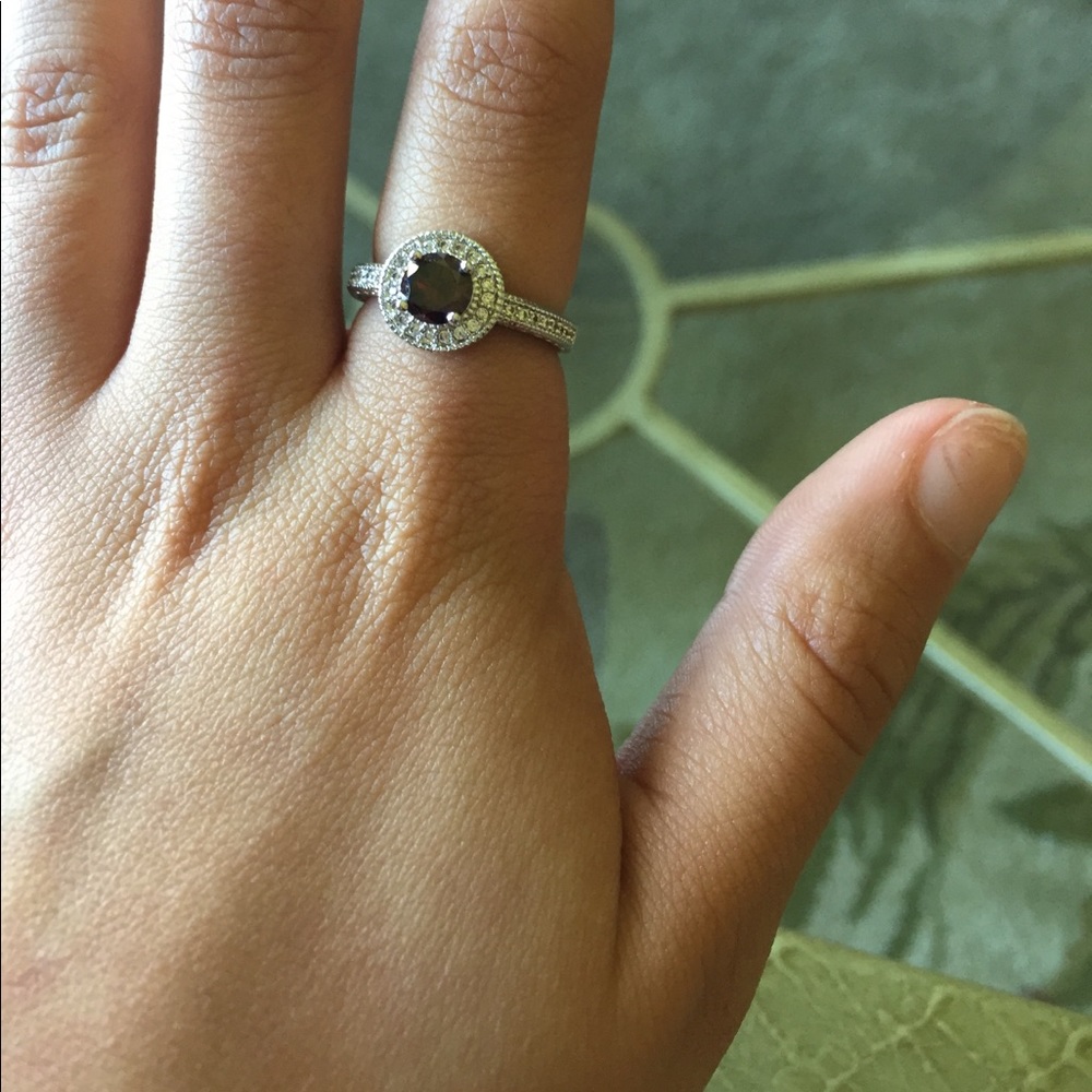 Never worn ring besides to take this photo.
