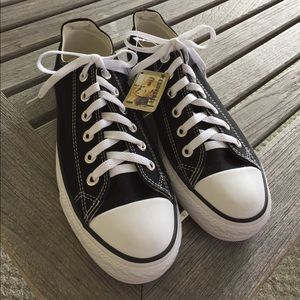 Brand new pair of black Converse shoes