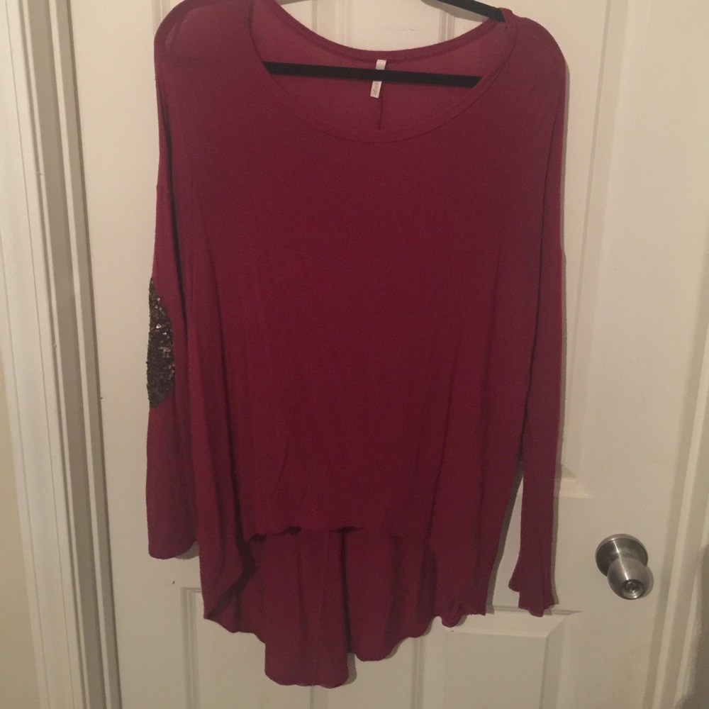 Deep maroon top with sequin elbow patches