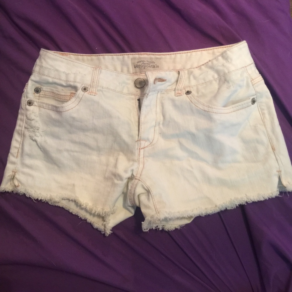 White semi distressed denim jean shorts
